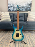 Palm Harbor Music Spira S-500 QAB acoustic guitar with a natural wood finish, showcasing the body and neck.