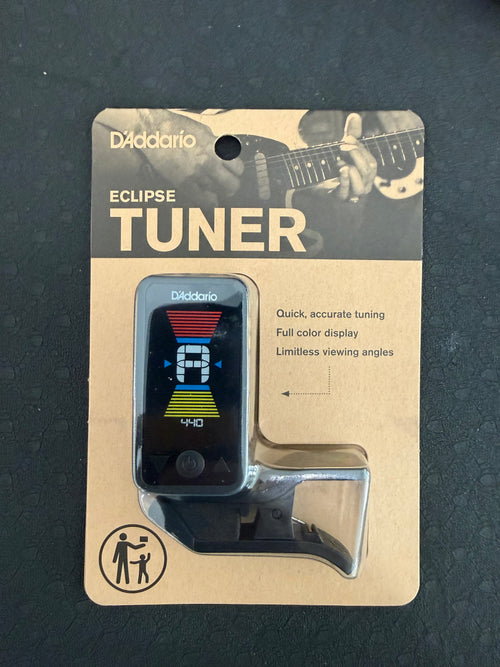 D’Addario Eclipse Headstock Tuner from Palm Harbor Music, showing a compact device attached to a guitar headstock for tuning.
