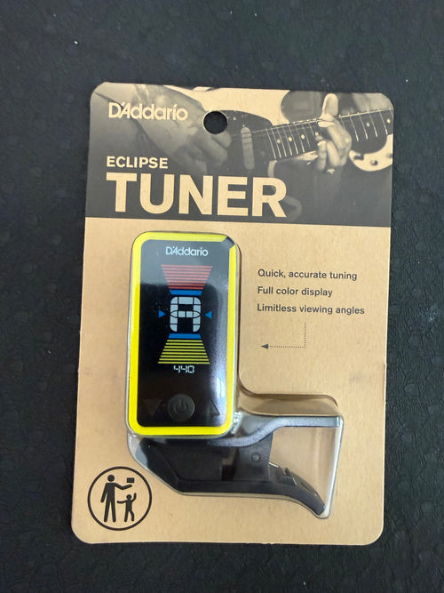 D'Addario Eclipse Headstock Tuner attached to guitar headstock showing tuning display and tuning pegs.
