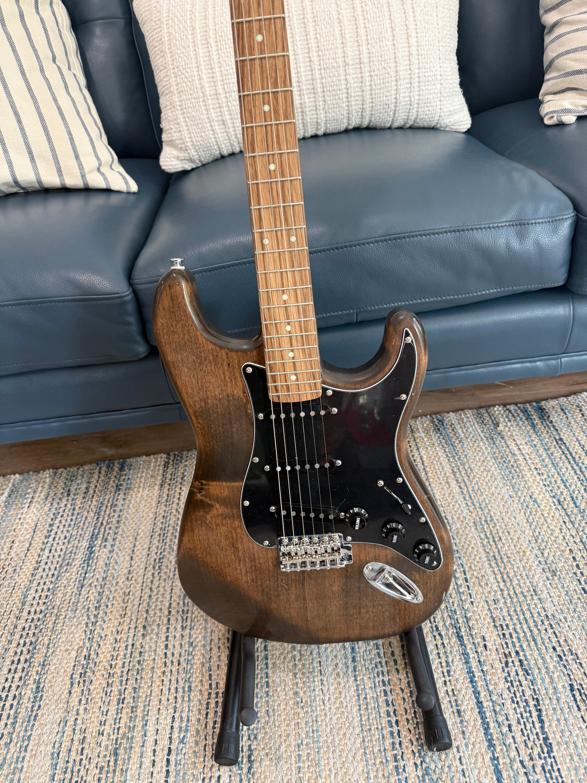 Ozona Guitar Works Suncaster US Aged Series 1-piece brown alder guitar body showing smooth aged finish and wood grain details.