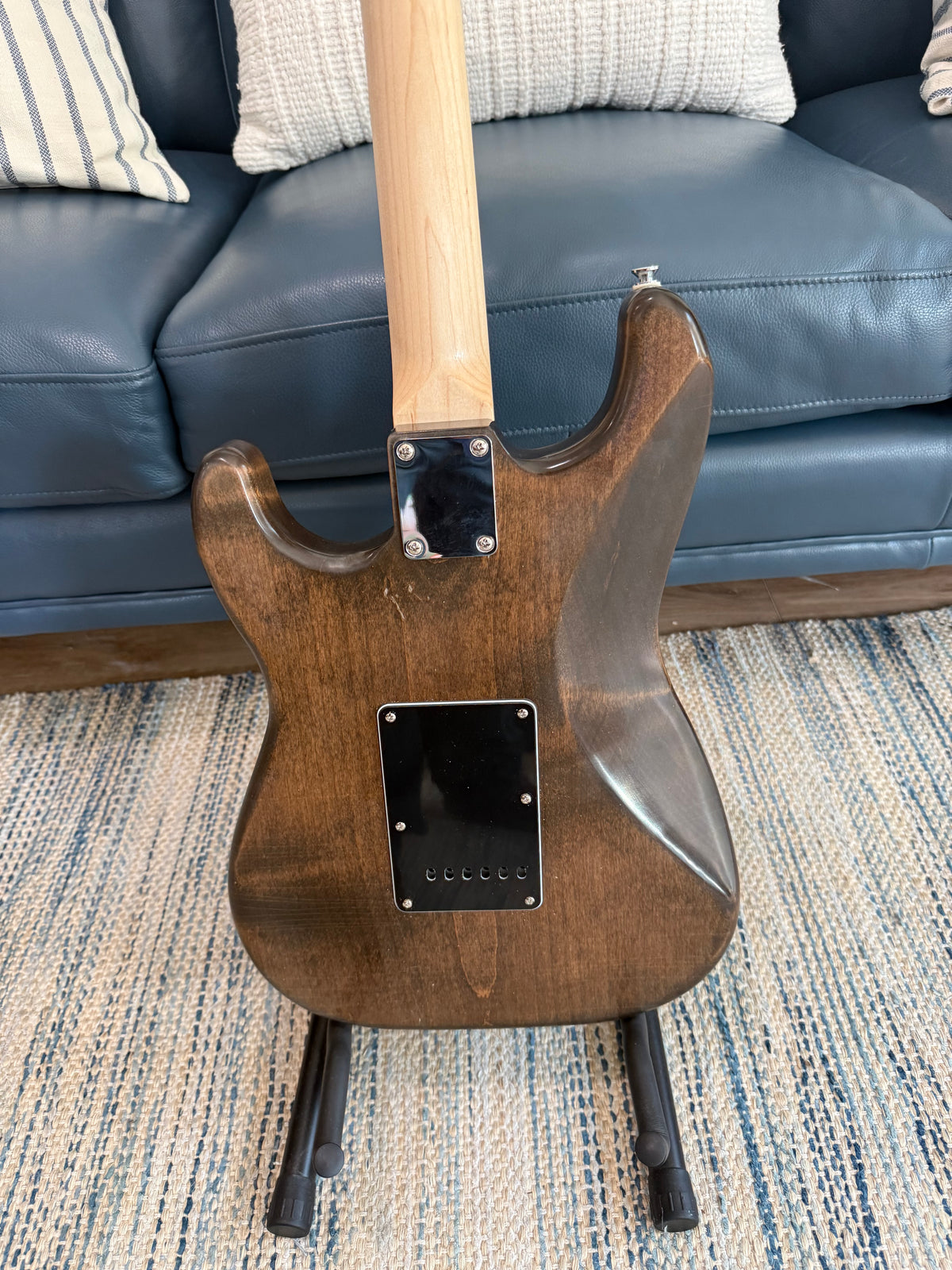 Ozona Guitar Works Suncaster US Aged Series 1-piece brown alder guitar body showing smooth wood grain and aged finish