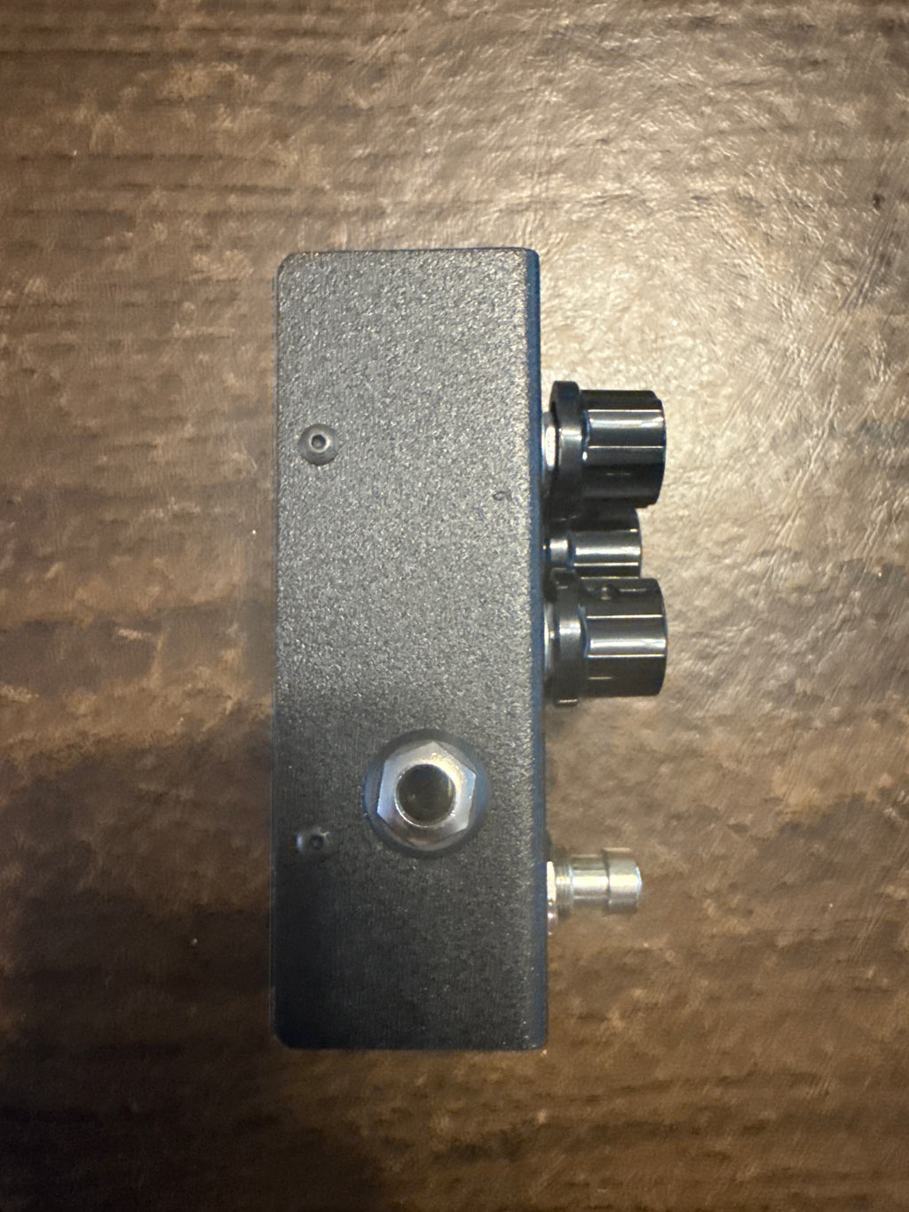 Cerberus Javelin Modern Distortion Pedal with sleek design and knobs, ideal for enhancing guitar sound.