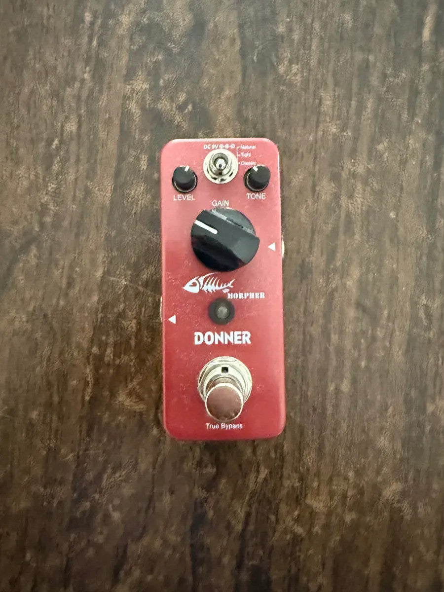 Donner Morpher distortion guitar effects pedal, used, showcasing three tone options in a classic design with tight sound.