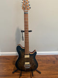 EVH Wolfgang Special guitar body in quilted maple with an indigo burst finish, showcasing its intricate wood grain.
