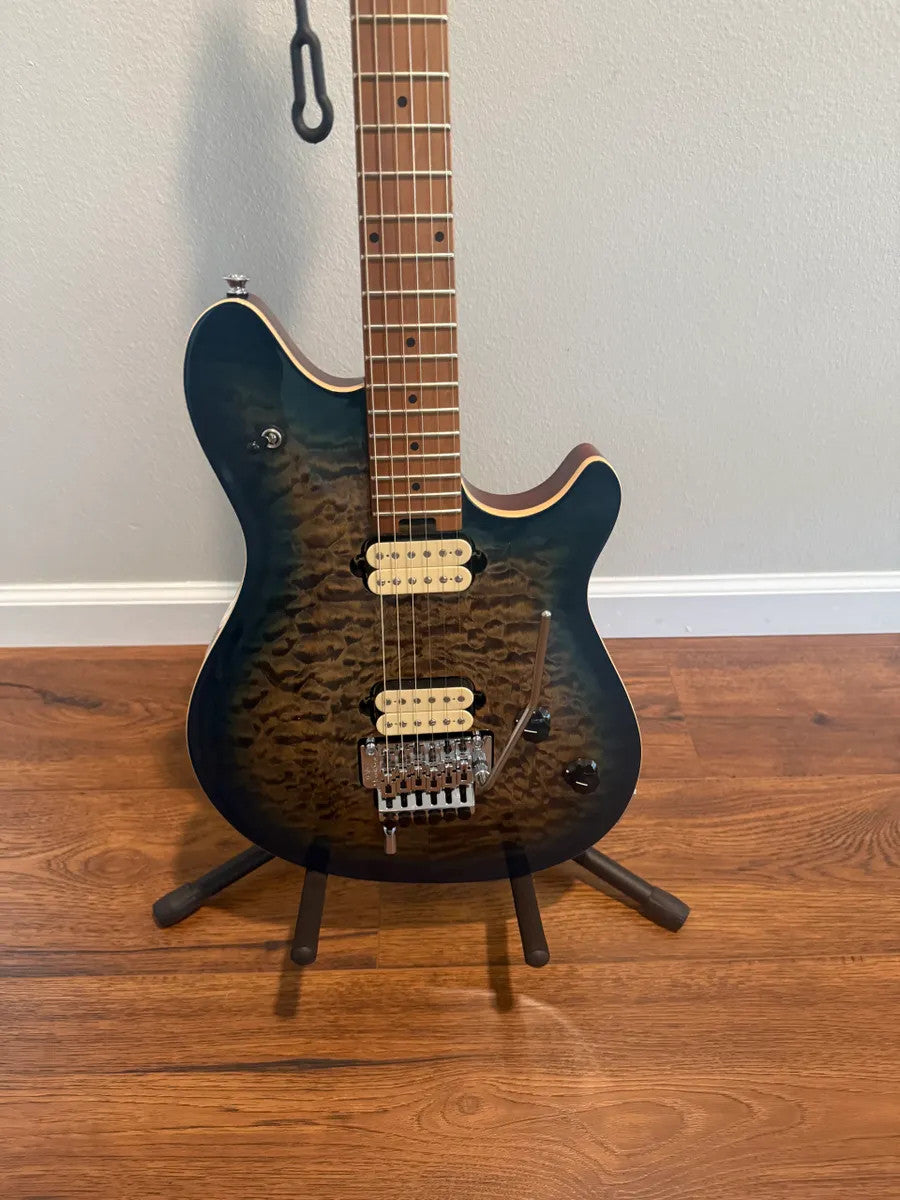 EVH Wolfgang Special body in quilted maple with an indigo burst finish, showcasing its unique wood grain and contours.