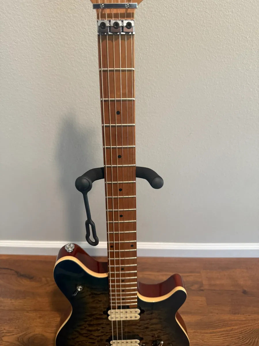 EVH Wolfgang Special guitar body in quilted maple with an indigo burst finish, showcasing unique wood grain patterns.