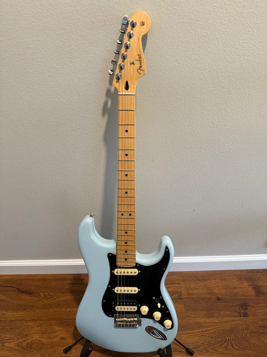 Used Fender Player Stratocaster HSS in Sonic Blue, solid body electric guitar with a sleek design and classic features.