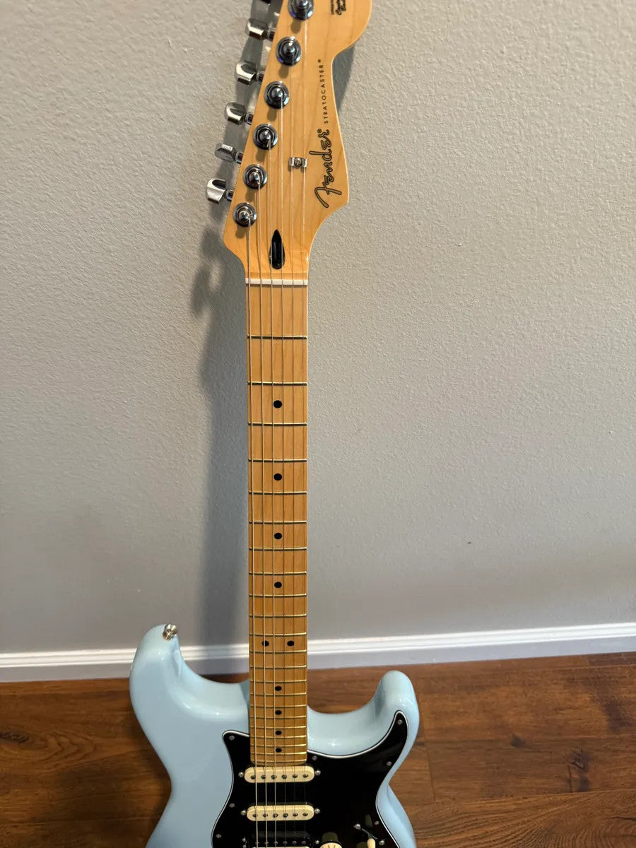 Used Fender Player Stratocaster HSS in Sonic Blue, solid body electric guitar with a sleek design.