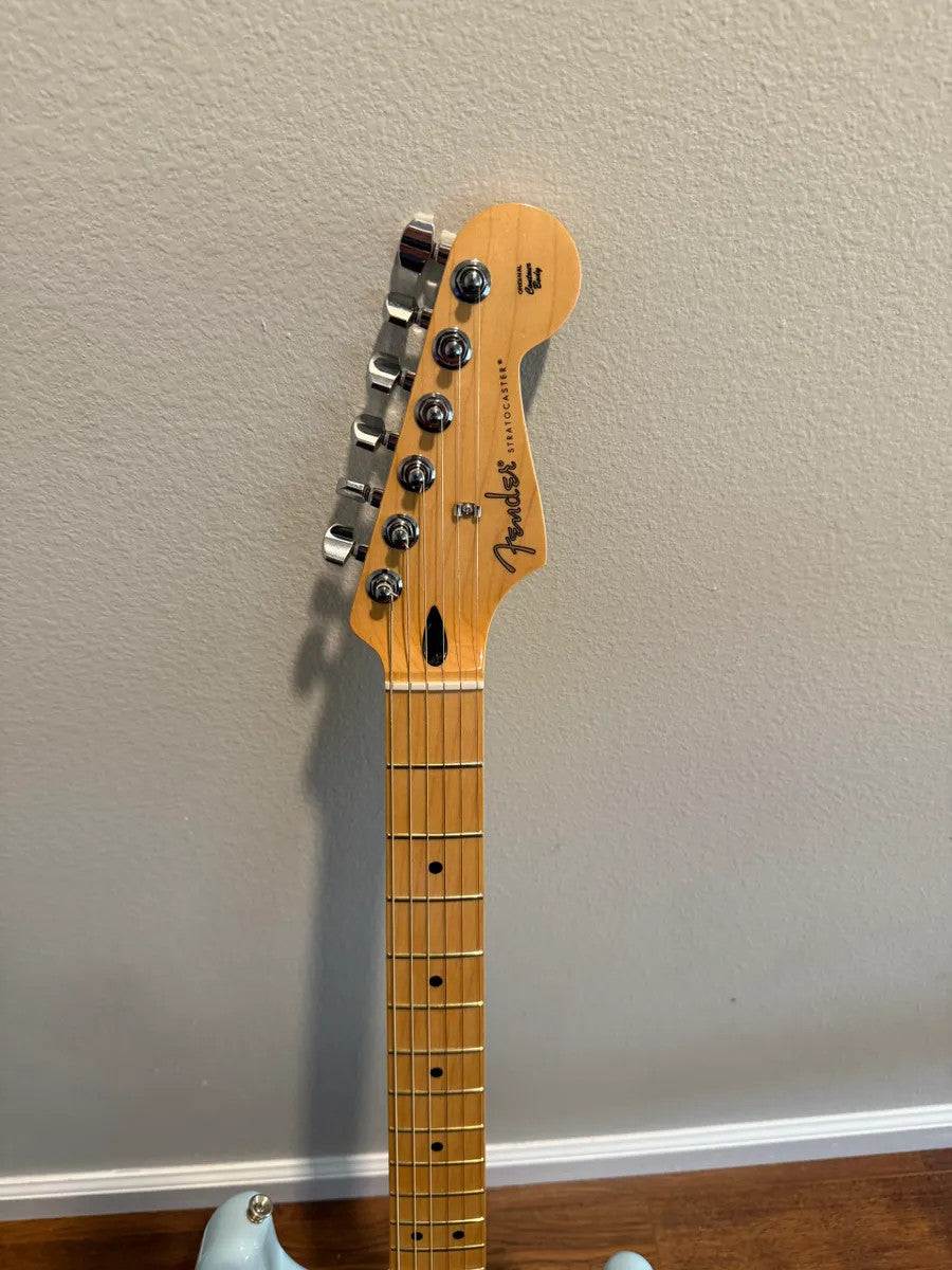 Used Fender Player Stratocaster HSS in Sonic Blue with solid body design and classic electric guitar features.