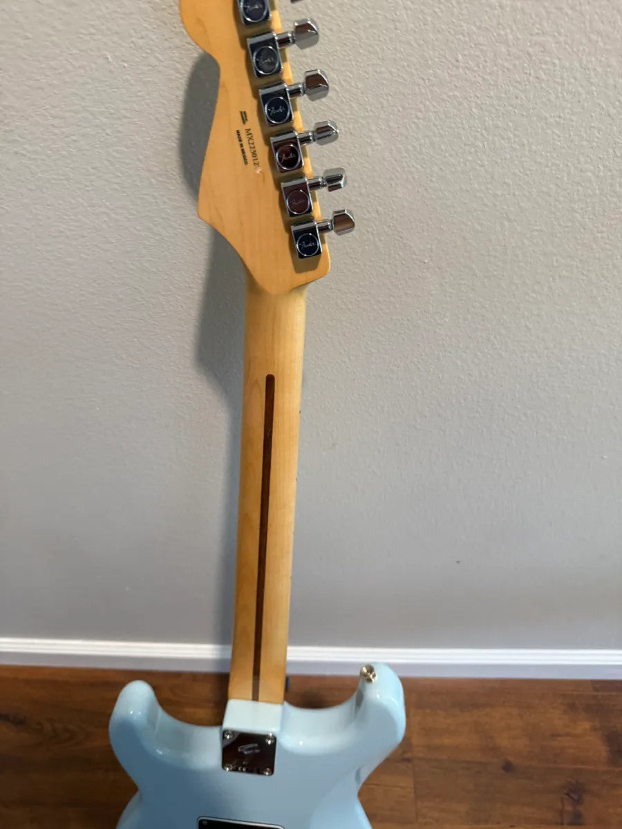 Used Fender Player Stratocaster HSS in Sonic Blue, featuring a solid body and classic electric guitar design.