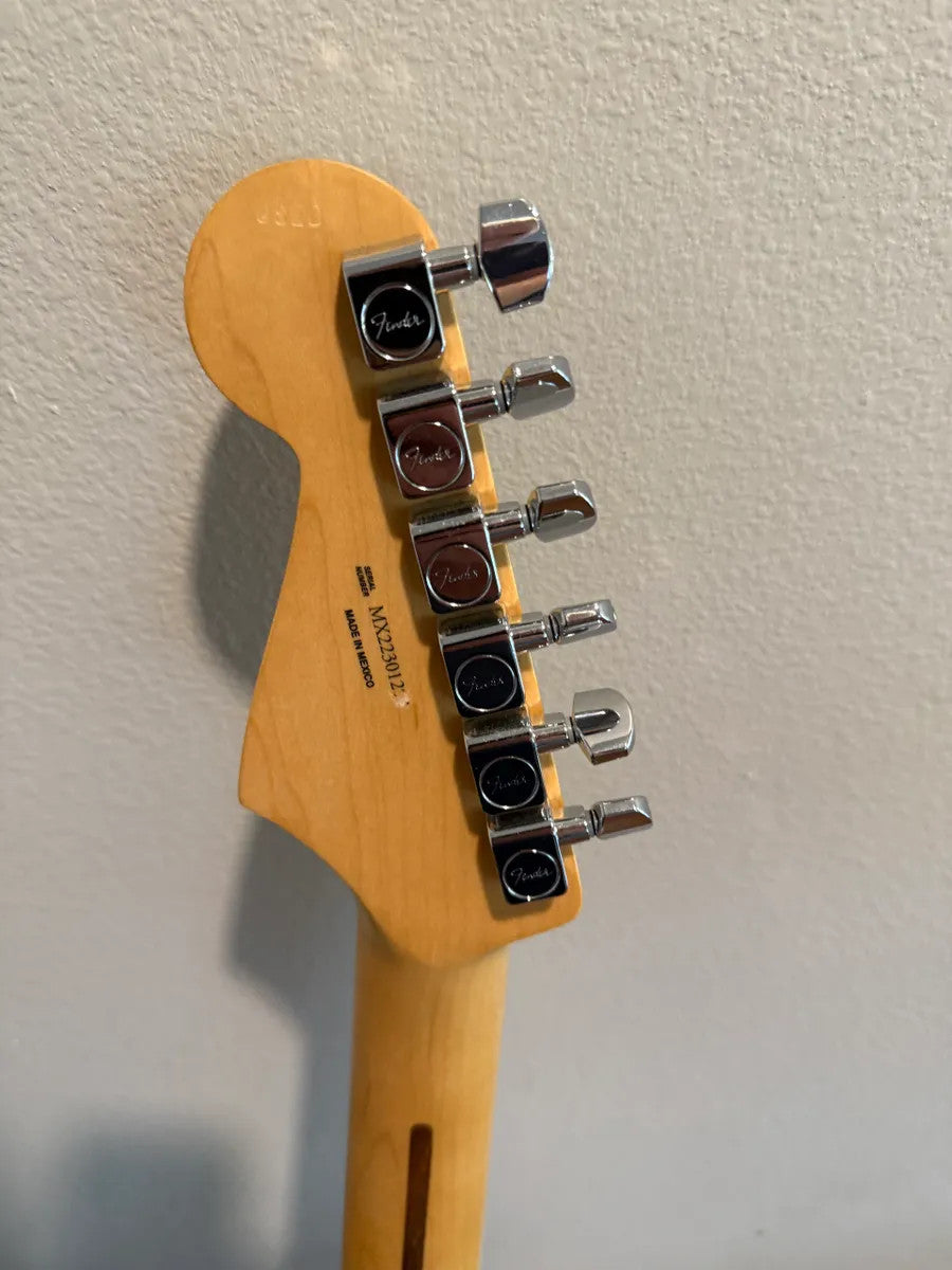 Used Fender Player Stratocaster HSS in Sonic Blue, showcasing solid body and classic electric guitar features.