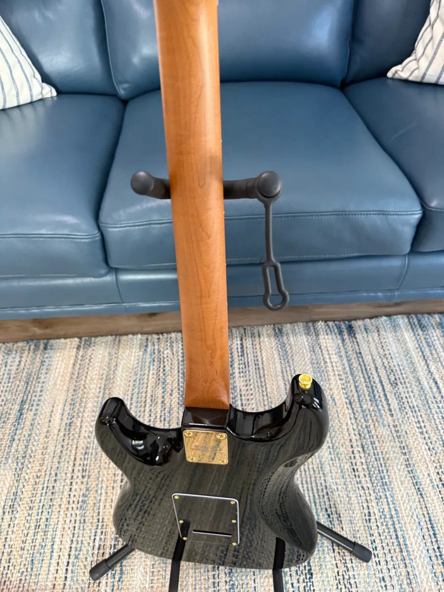 Jet Guitars JS-380 BK G electric guitar featuring a sleek black body and polished chrome hardware.