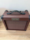 Palm Harbor Music NGW A15 acoustic amplifier with 8" speaker, 16 watts, and dual channels, showcasing its sleek design.
