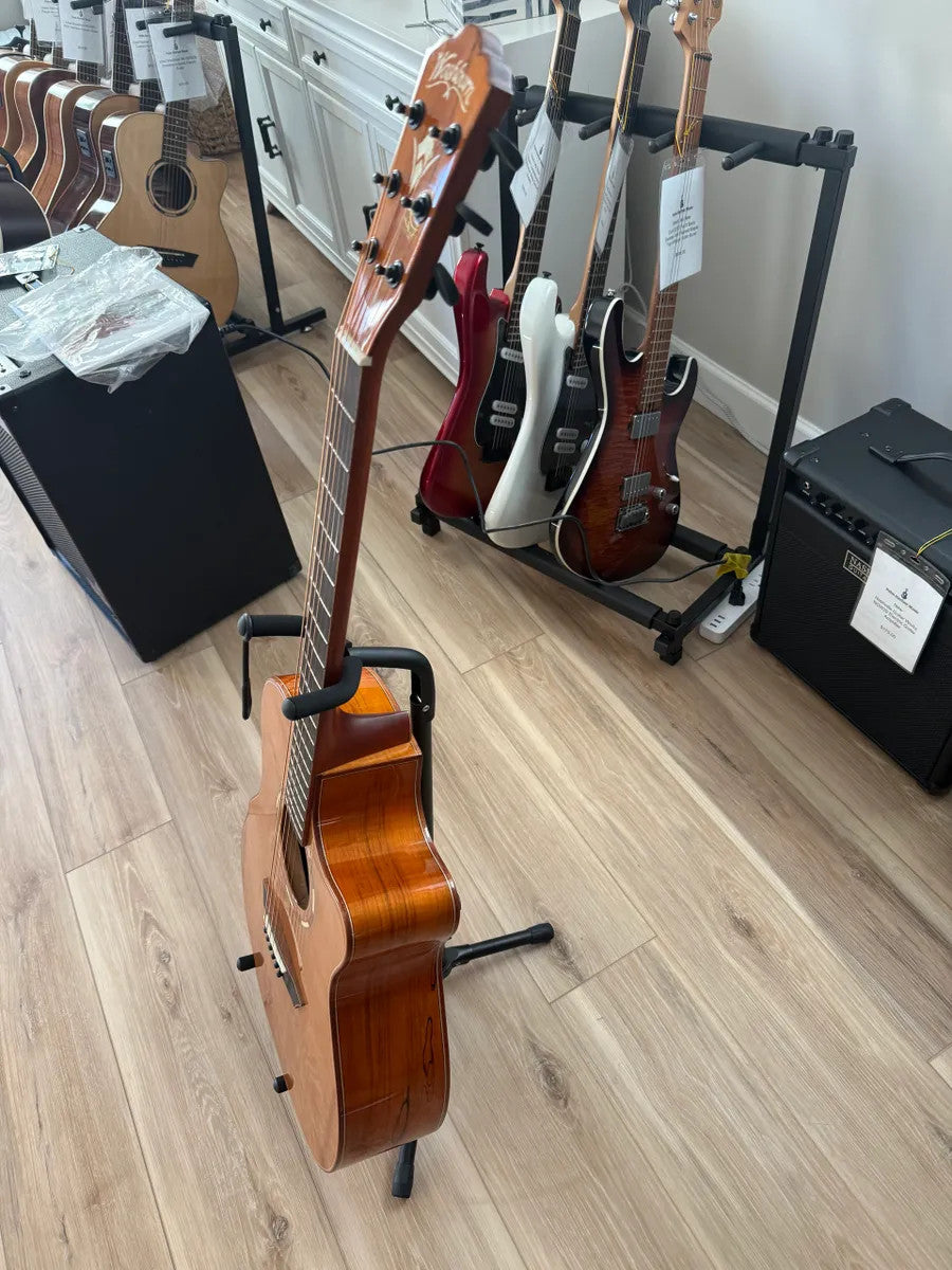Used Washburn Comfort Series WCG66SCE acoustic electric guitar with a natural finish and classic body shape.